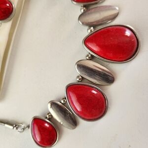 Lovely silver & red necklace w/ matching earrings.